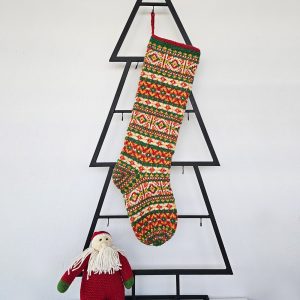 Handmade Christmas stocking with red, green, and yellow Fair Isle pattern