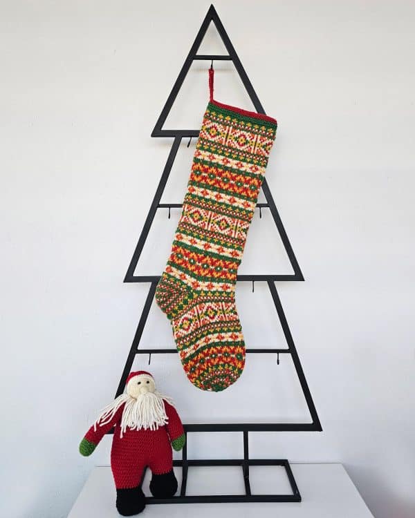 Handmade Christmas stocking with red, green, and yellow Fair Isle pattern