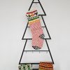 Handmade Christmas stocking in a festive holiday display by BHcrafts