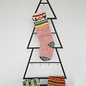 Handmade Christmas stocking in a festive holiday display by BHcrafts