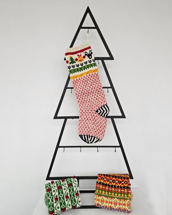 Handmade Christmas stocking in a festive holiday display by BHcrafts
