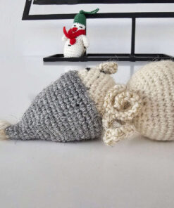 Crochet snowman Christmas tree decoration with gray beanie, cream torso, smiling expression