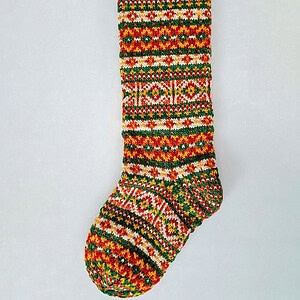 Sustainable knit Christmas stocking handmade as an ethical gift in Fair Isle style