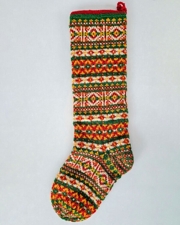 Sustainable knit Christmas stocking handmade as an ethical gift in Fair Isle style
