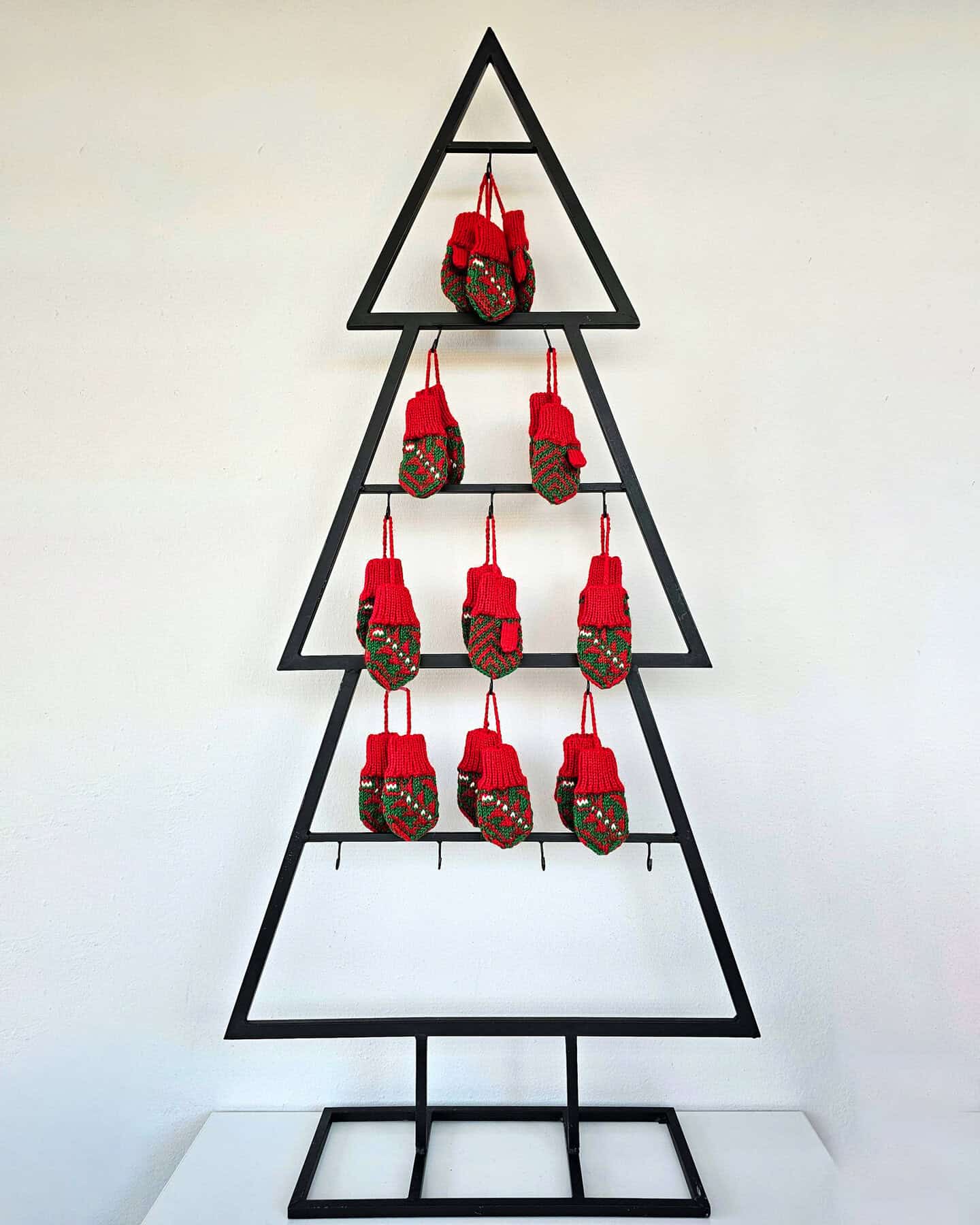 Set of hand-knit mini mitten ornaments for Christmas tree decoration