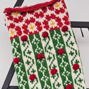Sustainable handmade Christmas stocking red green white knit eco-friendly holiday decor