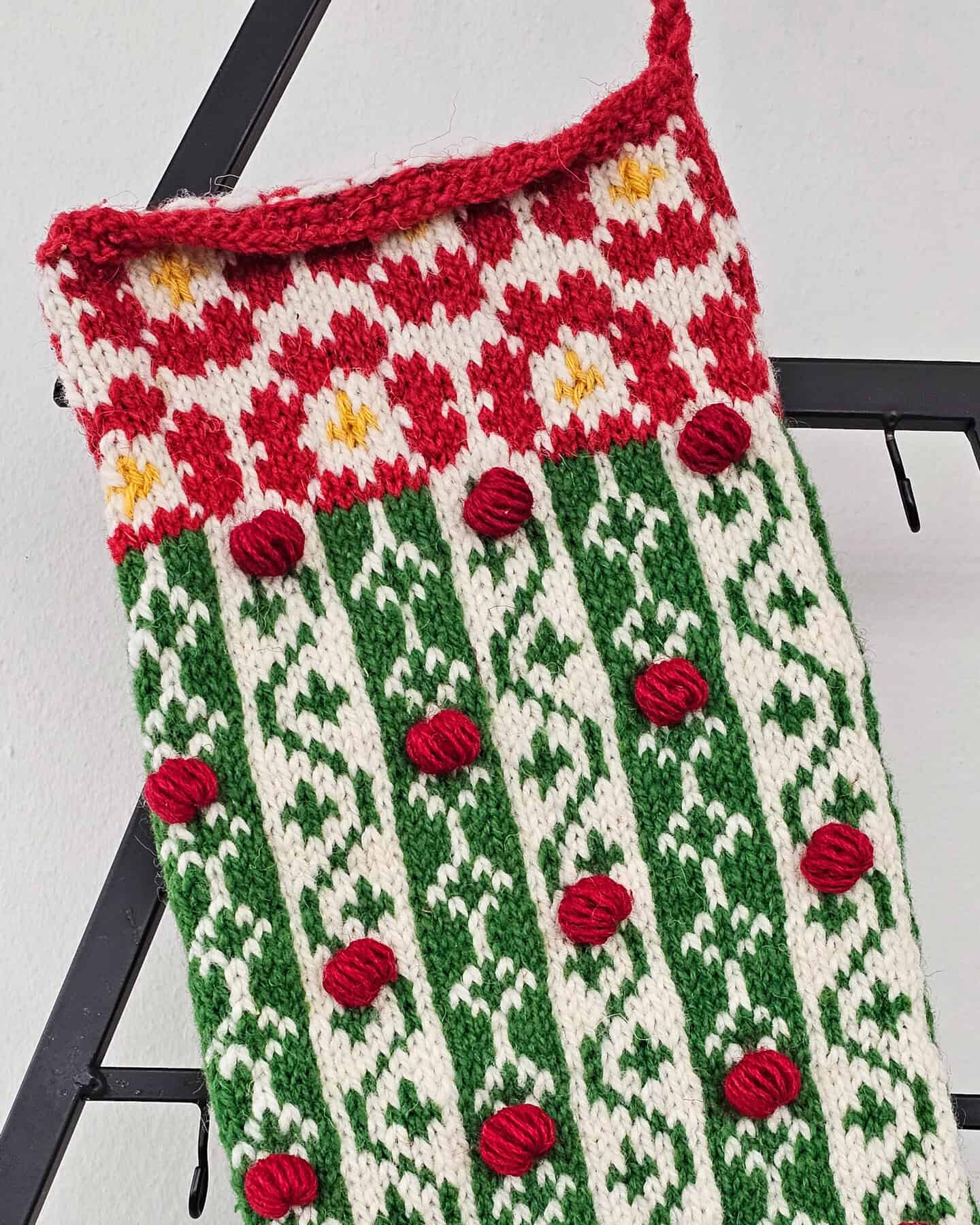 Sustainable handmade Christmas stocking red green white knit eco-friendly holiday decor