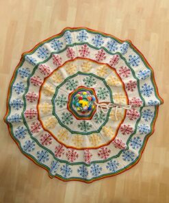Artisan-Made Hand-knit Fair Trade Christmas tree skirt with colorful snowflake pattern