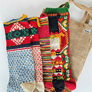 Set of five colorful hand-knitted Christmas stockings crafted by BHcrafts artisans