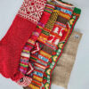 Bundle of five Fair Trade handmade Christmas stockings in various traditional designs.