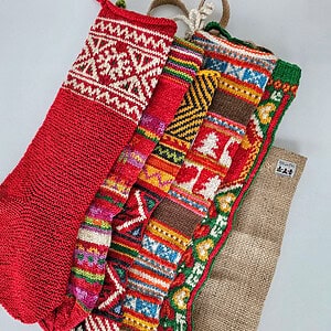 Bundle of five Fair Trade handmade Christmas stockings in various traditional designs.