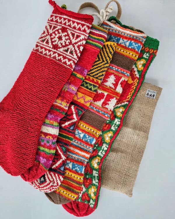 Bundle of five Fair Trade handmade Christmas stockings in various traditional designs.