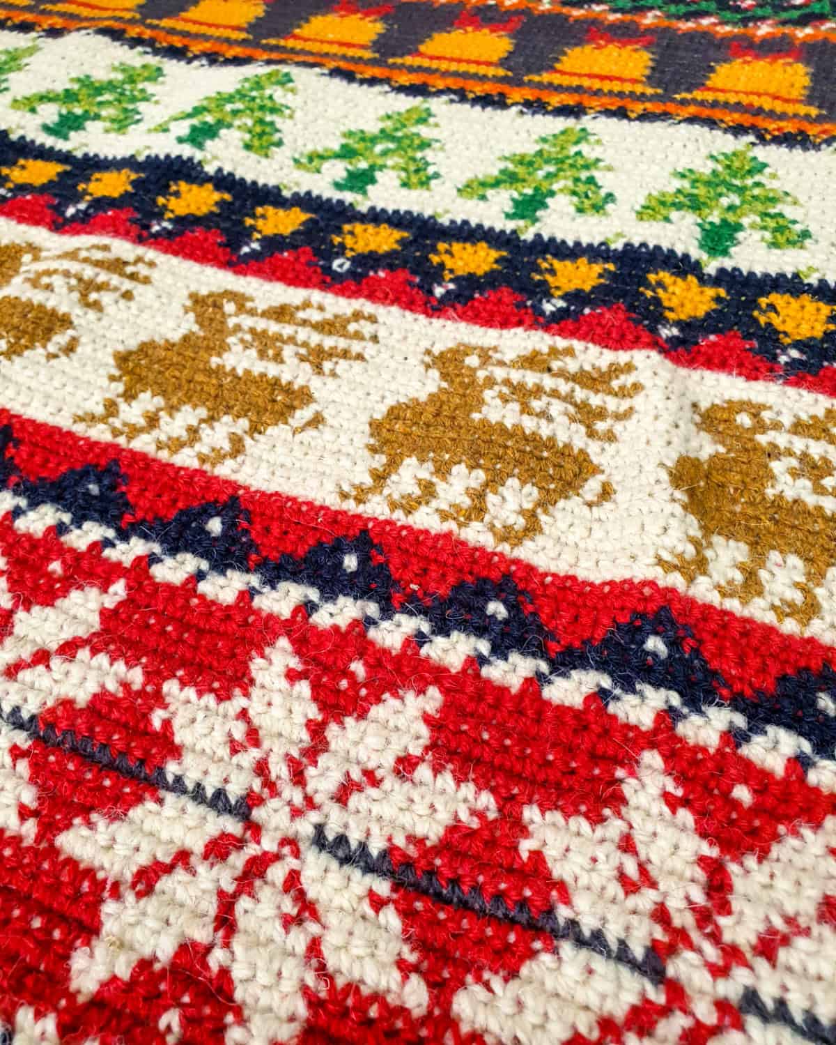 Eco-friendly handmade crochet blanket with Nordic-style Christmas design