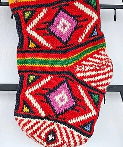 Artisan knit stocking for Christmas gifts and holiday decoration