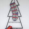Hand-knit Holiday stocking in blue with white snowflake and red border pattern