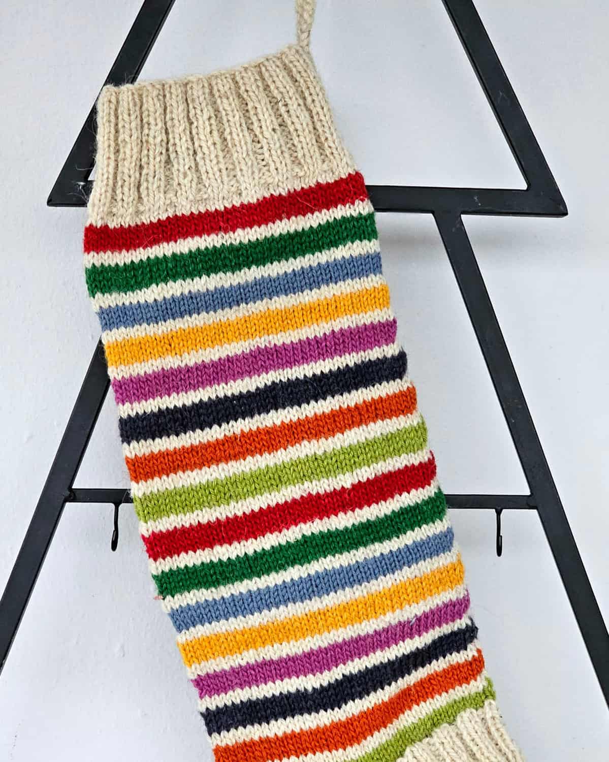 Colorful striped Christmas stocking for mantel or tree display