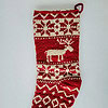 Traditional red and white Christmas tree stocking with reindeer, fair trade