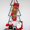 knitted Christmas stocking with vibrant square and rectangular patterns, ideal for personalization.