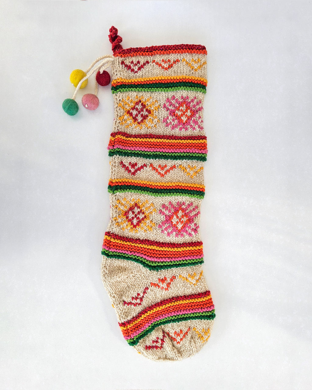 Fair Trade handmade wool Christmas stocking in red and multicolor designs