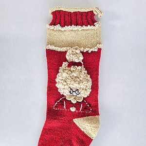 Red Knitted Christmas stocking with Mrs. Claus motifs