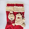 Red Fair Trade handmade Christmas stockings with Santa and Mrs. Claus design