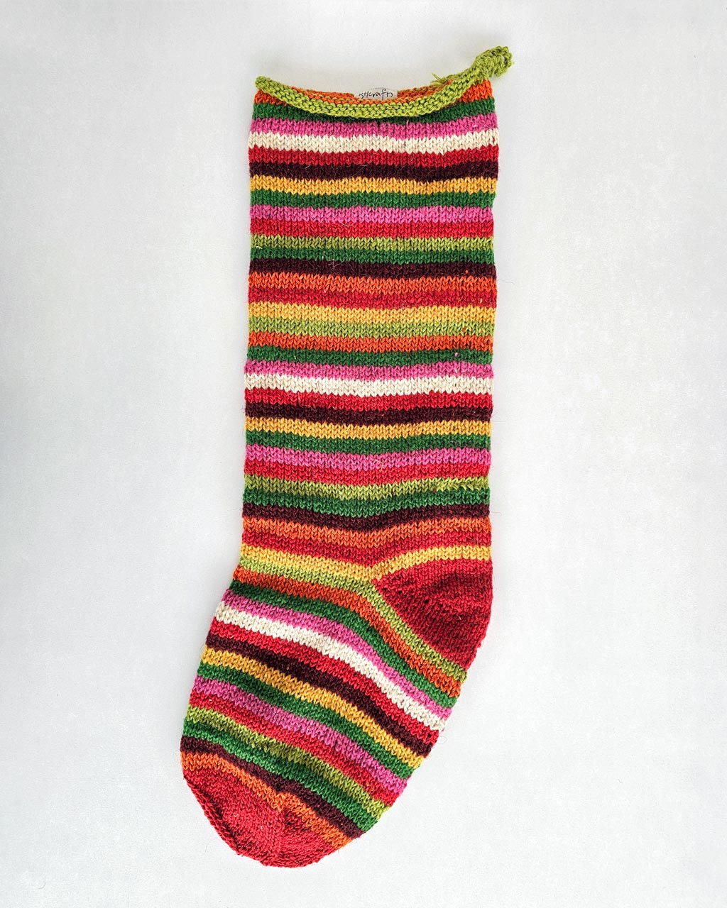 Hand-knit striped Christmas stocking, multicolor, artisan made holiday home decor