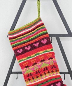 Handmade knitted Christmas stocking with colorful Hearts and Stripes