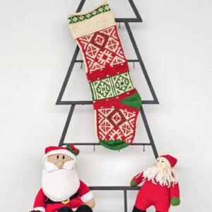 Hand-knitted multicolor traditional Christmas stocking with rich pattern.
