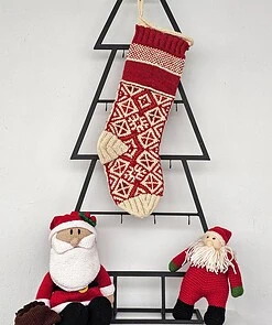 Hand-knitted red Christmas stocking with traditional Bosnian pattern, personalized name