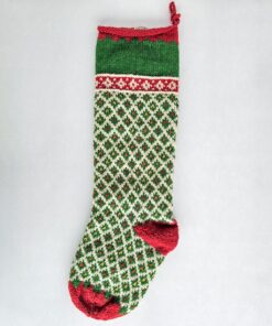 Personalized green knit Christmas stocking with red cuff and white diamond pattern, custom name on the cuff