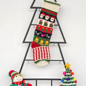 Personalized hand-knitted Christmas stocking with Santa and gift patterns.