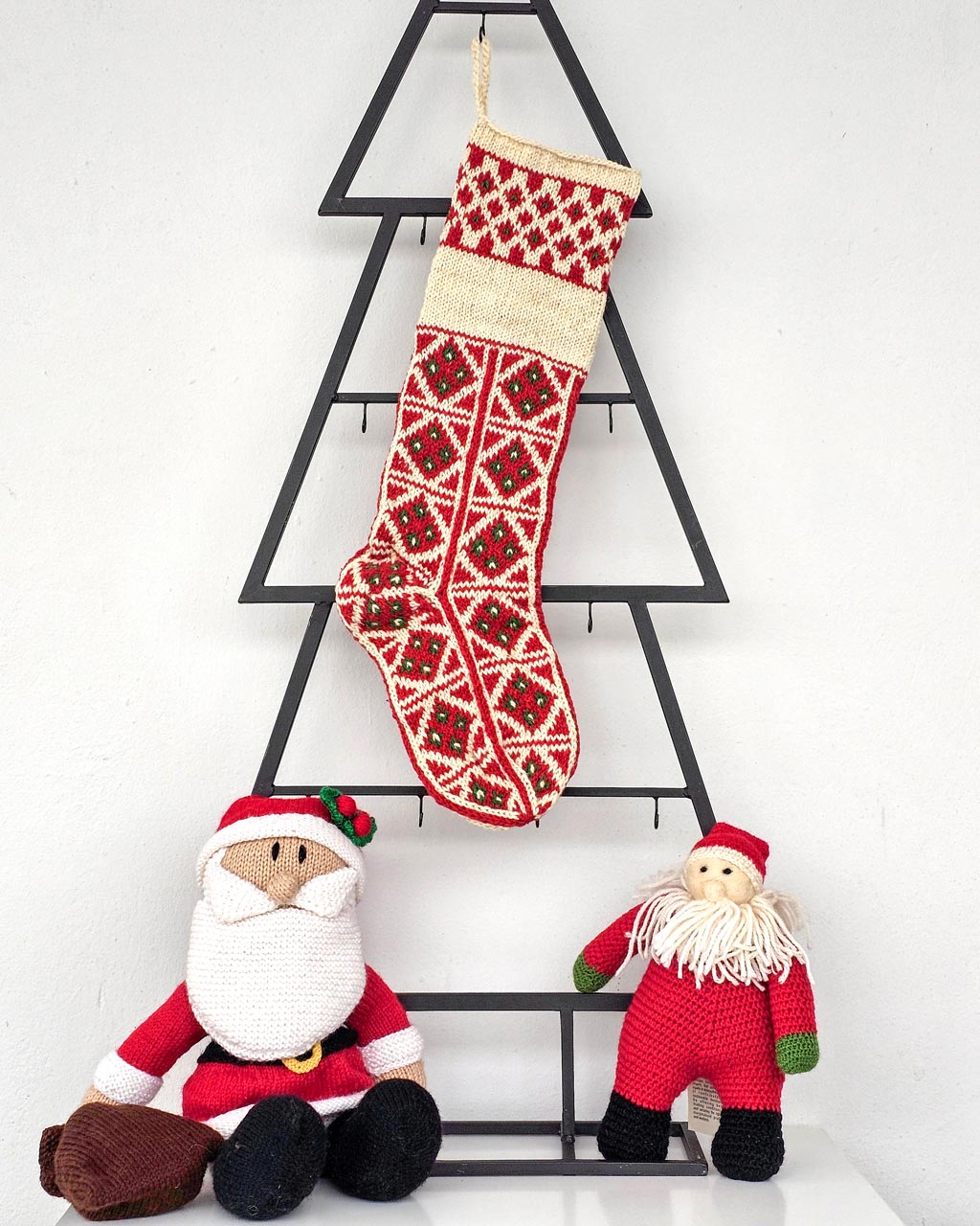 Red jacquard-knit Christmas stocking with personalized name‚.