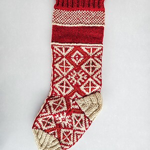 Hand-knitted red Christmas stocking with traditional Bosnian pattern, personalized name.