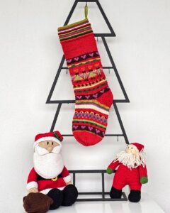 Personalized fair-trade Christmas stocking with stripes and hearts pattern; Festive home decor