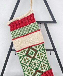 Traditional hand-knitted Christmas stocking in red, green, and cream with customizable embroidered name.