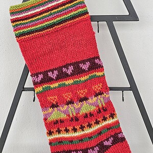 Close-up of placement for embroidered name area on personalized striped Christmas stocking.