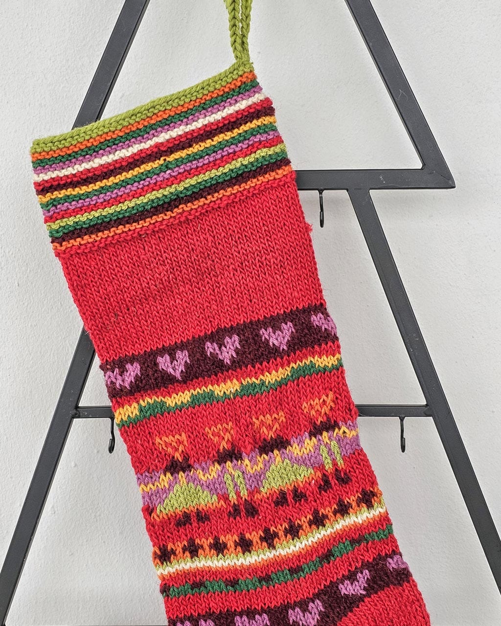 Close-up of placement for embroidered name area on personalized striped Christmas stocking.