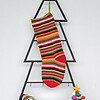 Hand-knit striped Christmas stocking in vivid multicolor