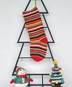 Hand-knit striped Christmas stocking in vivid multicolor