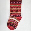 Festive knit stocking with hearts and stripes, fair-trade holiday décor