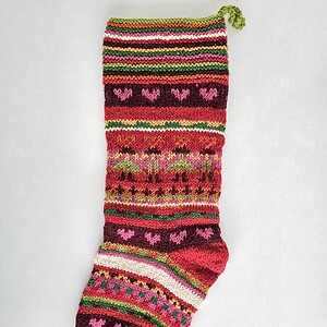 Festive knit stocking with hearts and stripes, fair-trade holiday décor