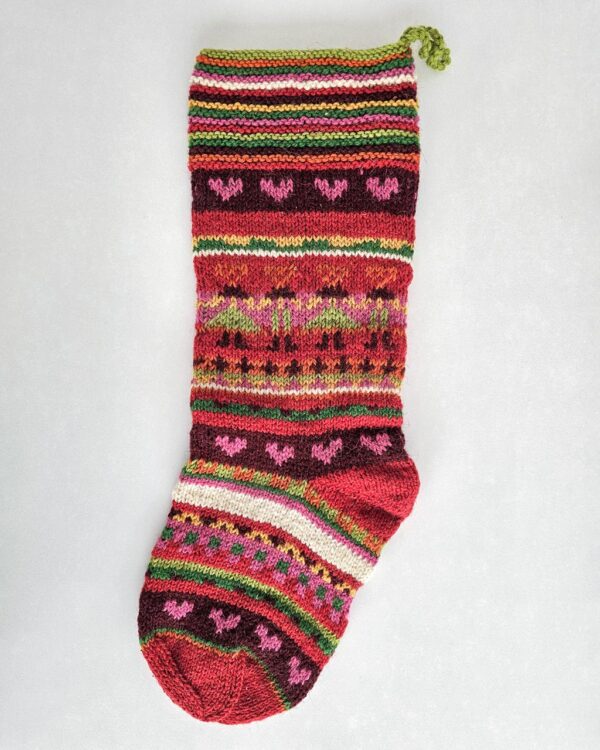 Festive knit stocking with hearts and stripes, fair-trade holiday décor