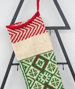 Top view of green Christmas stocking with custom name placement