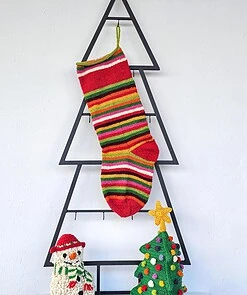Hand-knit personalized striped Christmas stocking in vivid multicolor