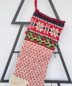 Close-up of the top section of a Handmade Christmas Stocking With Snowflakes to lighten up your decor